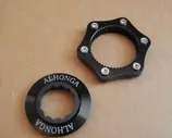 Адаптер втулка Center Lock/ротор 6 болтов,черн.Alhonga