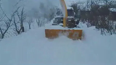 Роторный снегоуборщик