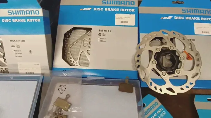 Тормозные роторы и колодки Шимано. Bremsscheiben und Bremsbeläge Marke Shimano.
